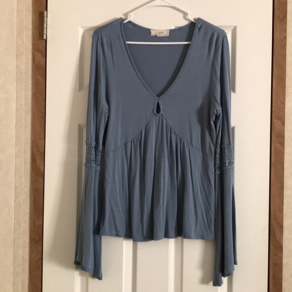 Long sleeve light blue bell sleeve top